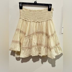 This medium, tan By Together skirt has been very lightly used.
